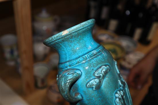 A Chinese celadon vase, a Chinese figure and two turquoise dragon vases